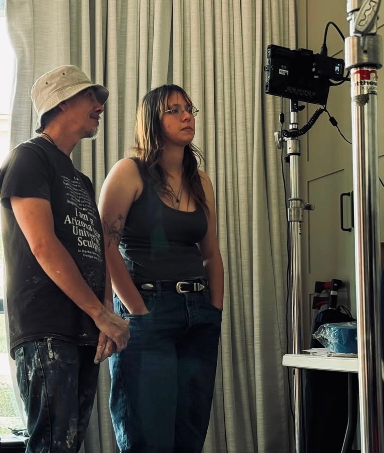 Spencer Tracy Brown and the Made Anew filmmaker reviewing the production monitor together